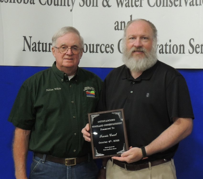 Outstanding Woodland Conservationist was Travis Creel. He is pictured with Neshoba SWCD Chairman Nelson White.
